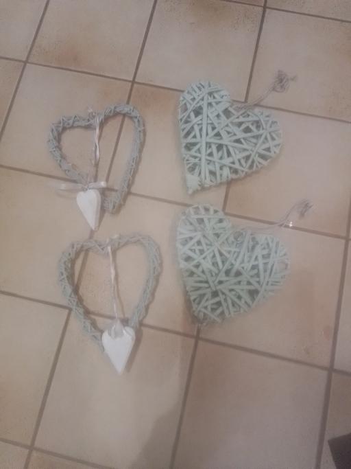  — FOUR GREEN HANGING HEARTS