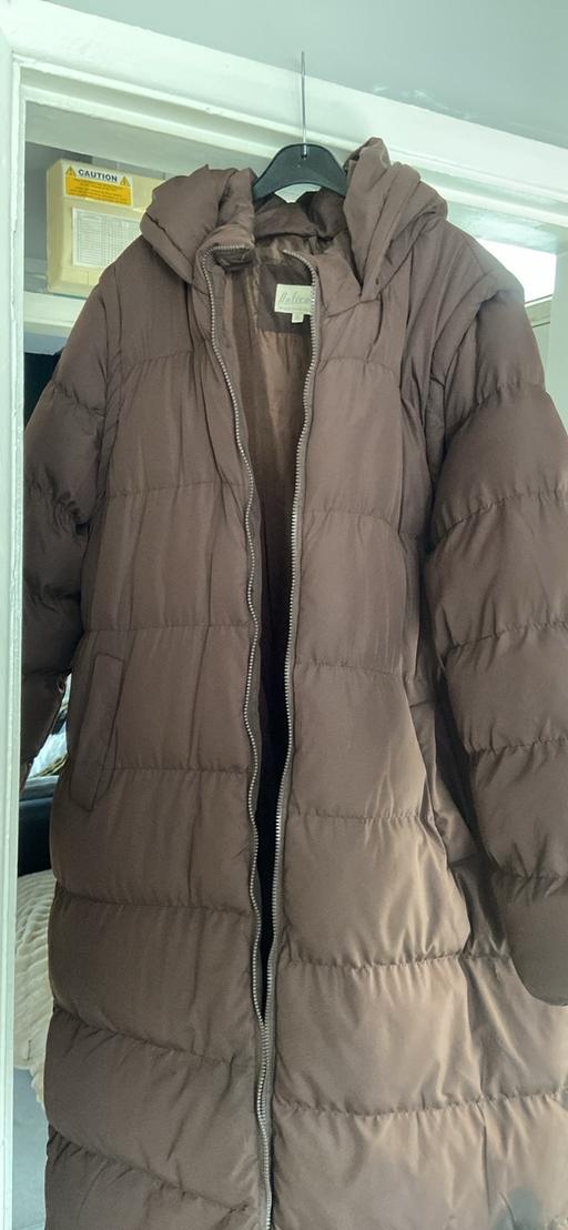  — Women’s brown coat