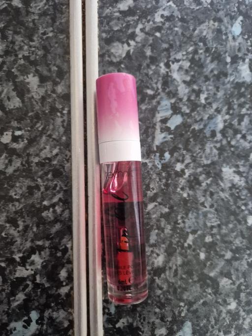  — brand new cherry lip oil