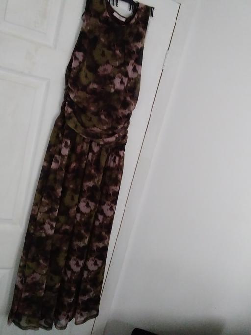  — Dress