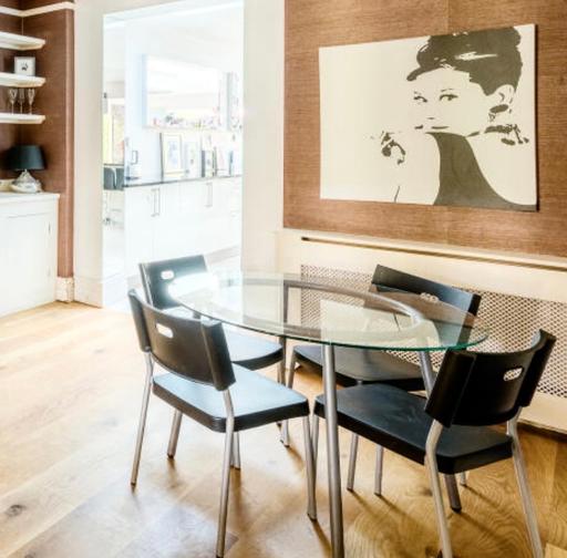  — Glass Dining Table with 4 black chairs