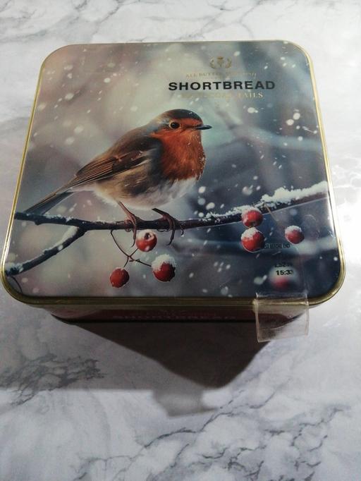 — Empty Tin